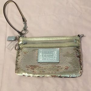 Coach  gold sequin wristlet